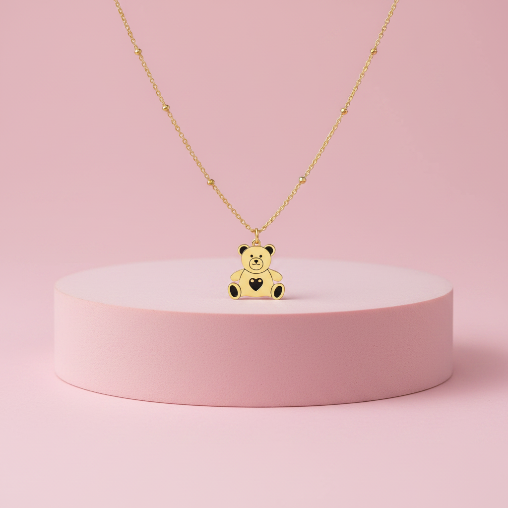Collana orsetto cuore nero su piedistallo rosa cipria