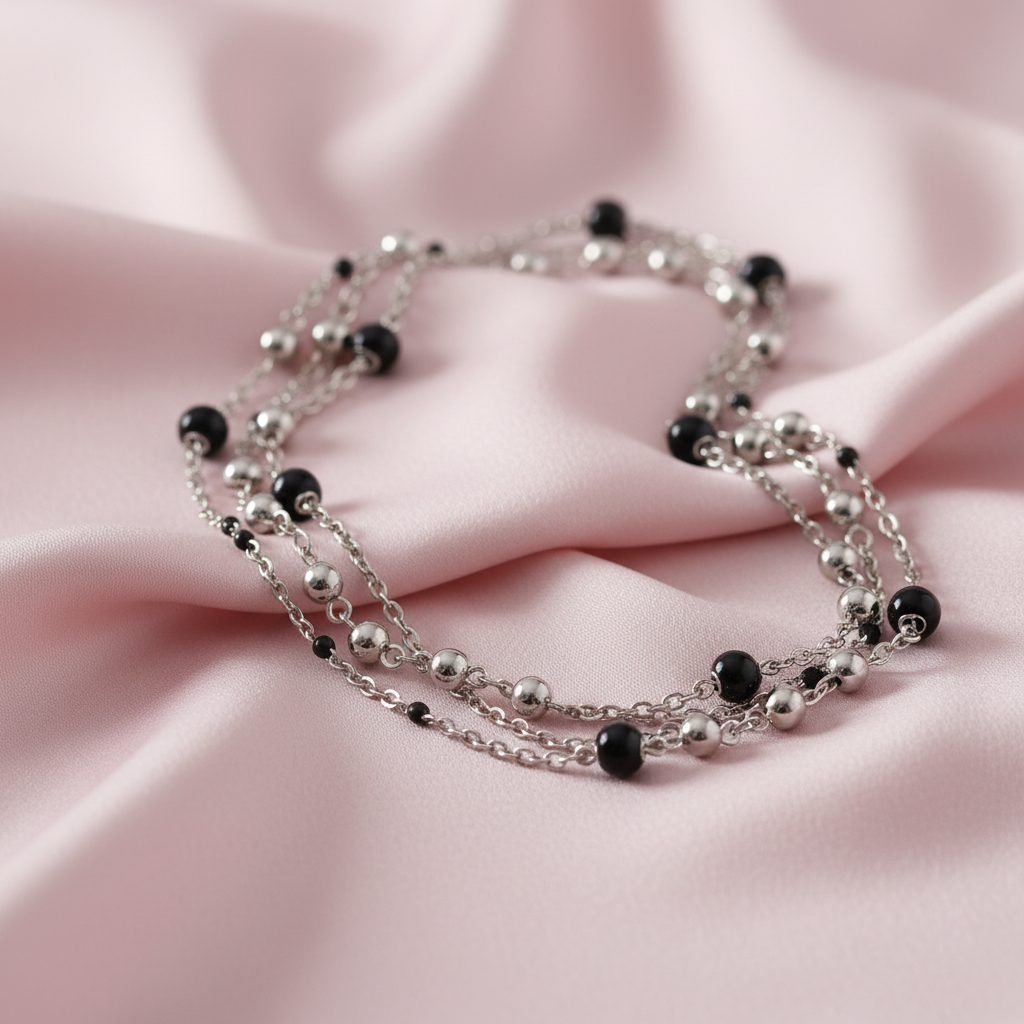 Collana multifilo sfere nere mood seta rosa cipria