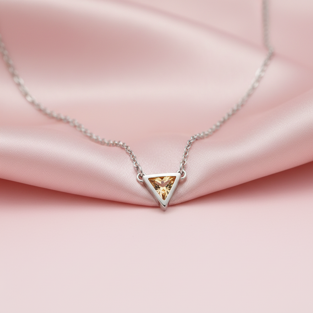 Collana triangolo zircone topazio mood seta rosa cipria