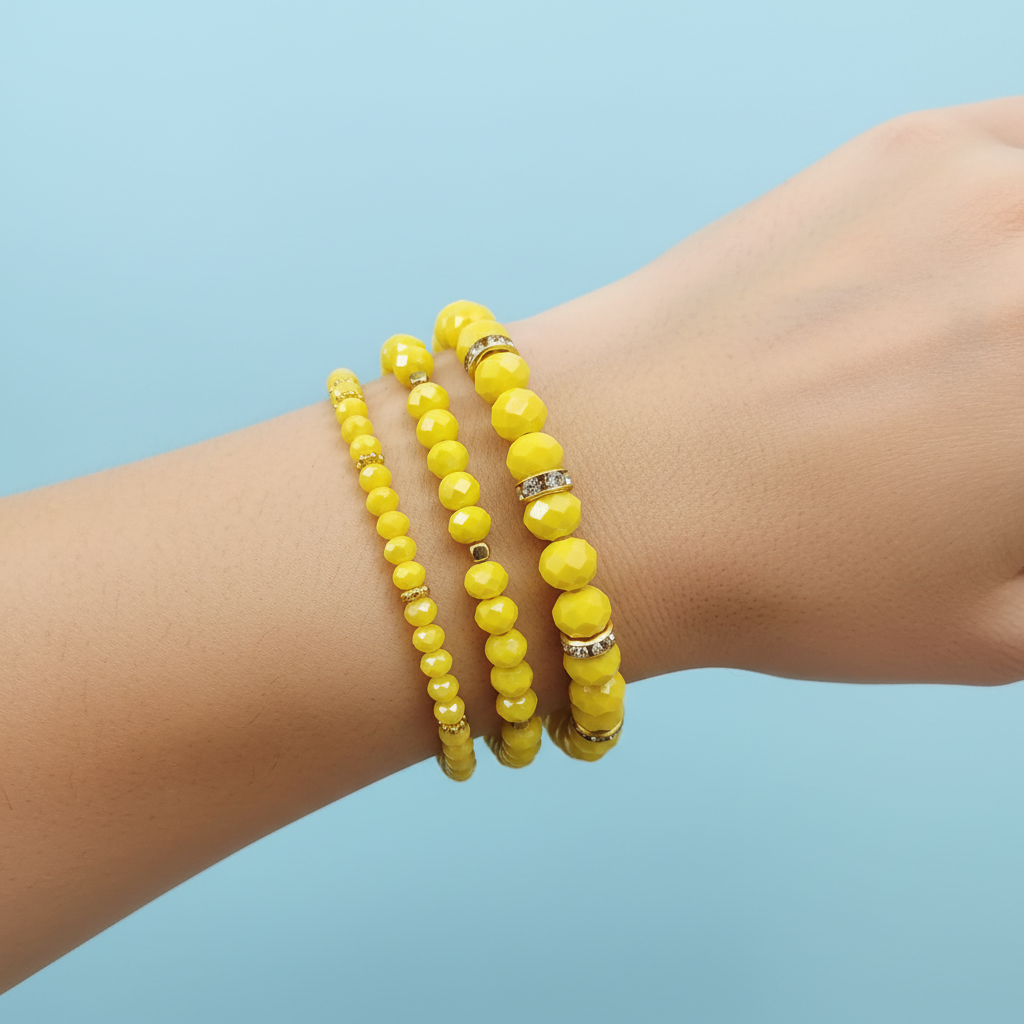 Set 3 bracciali cristallo giallo indossati al polso