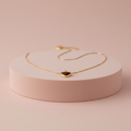 Lamù Collana Oro 18k Cuore Smaltato Marrone su piedistallo rosa cipria