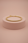 Lamù bracciale acciaio dorato catena spiga su piedistallo rosa cipria