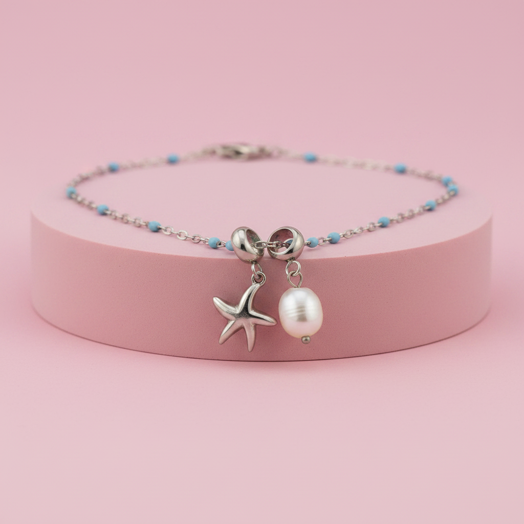 Collana stella marina perla turchese su piedistallo rosa cipria